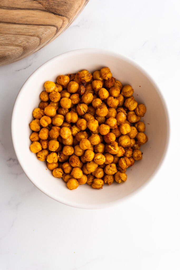 Crispy air fryer chickpeas in a white bowl.
