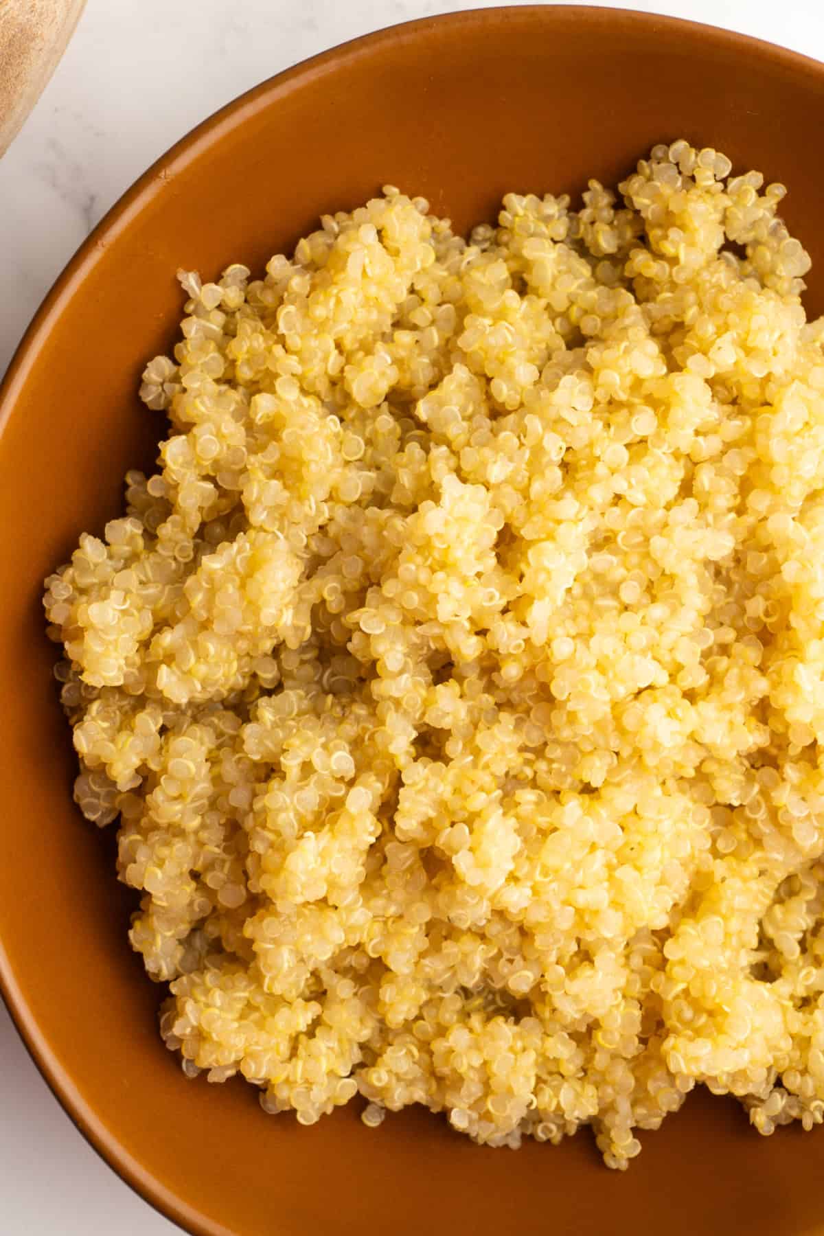 Close up of fluffy quinoa in a bowl.