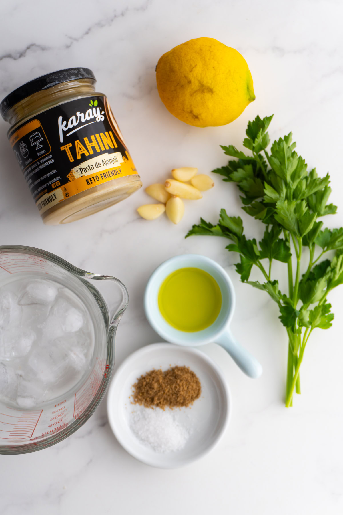 Ingredients needed to make lemon tahini sauce.