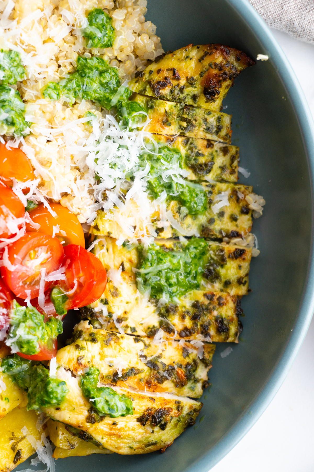 Close up of sliced pesto chicken.