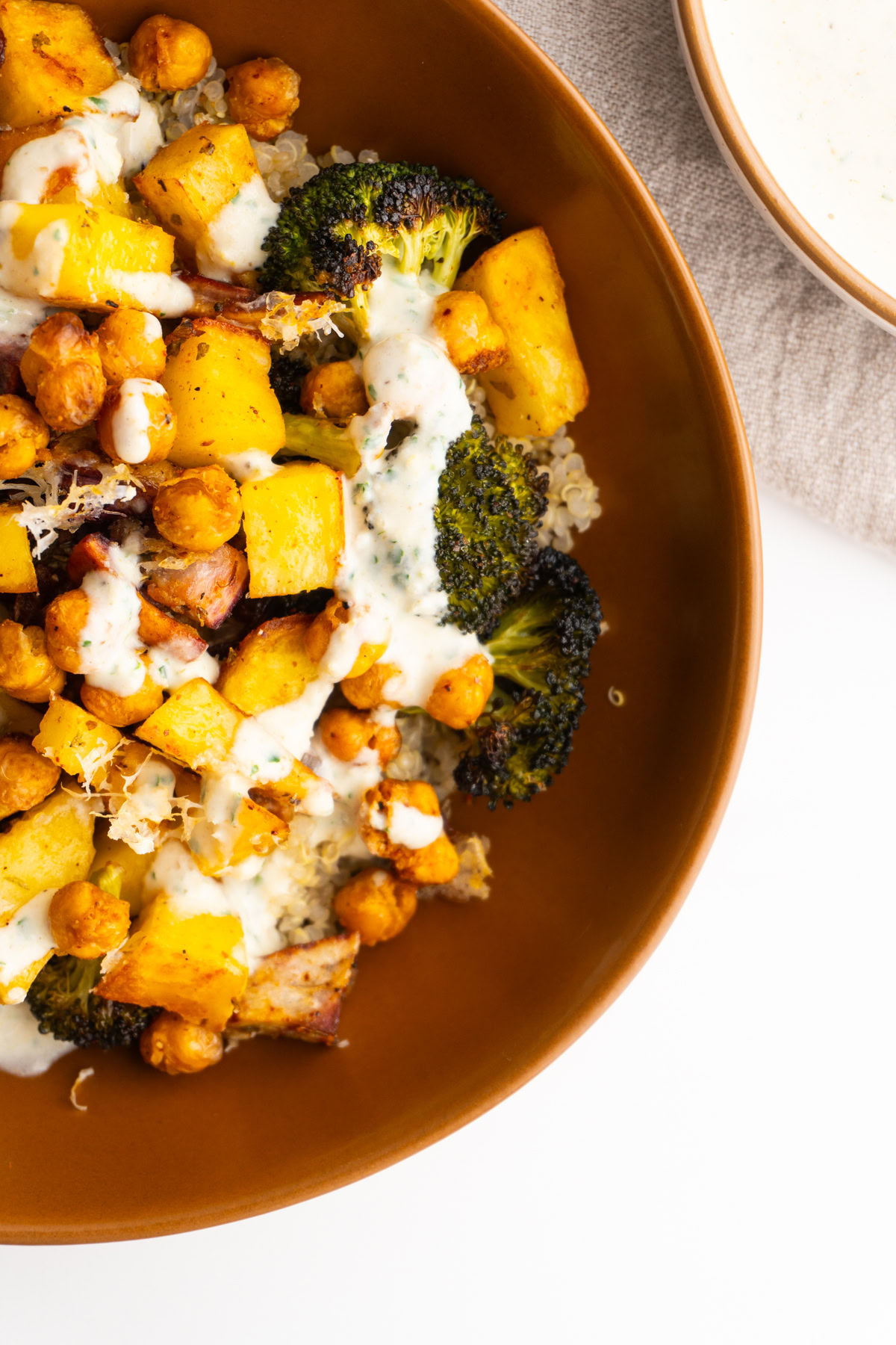 Close up of the side of a roasted veggie bowl.