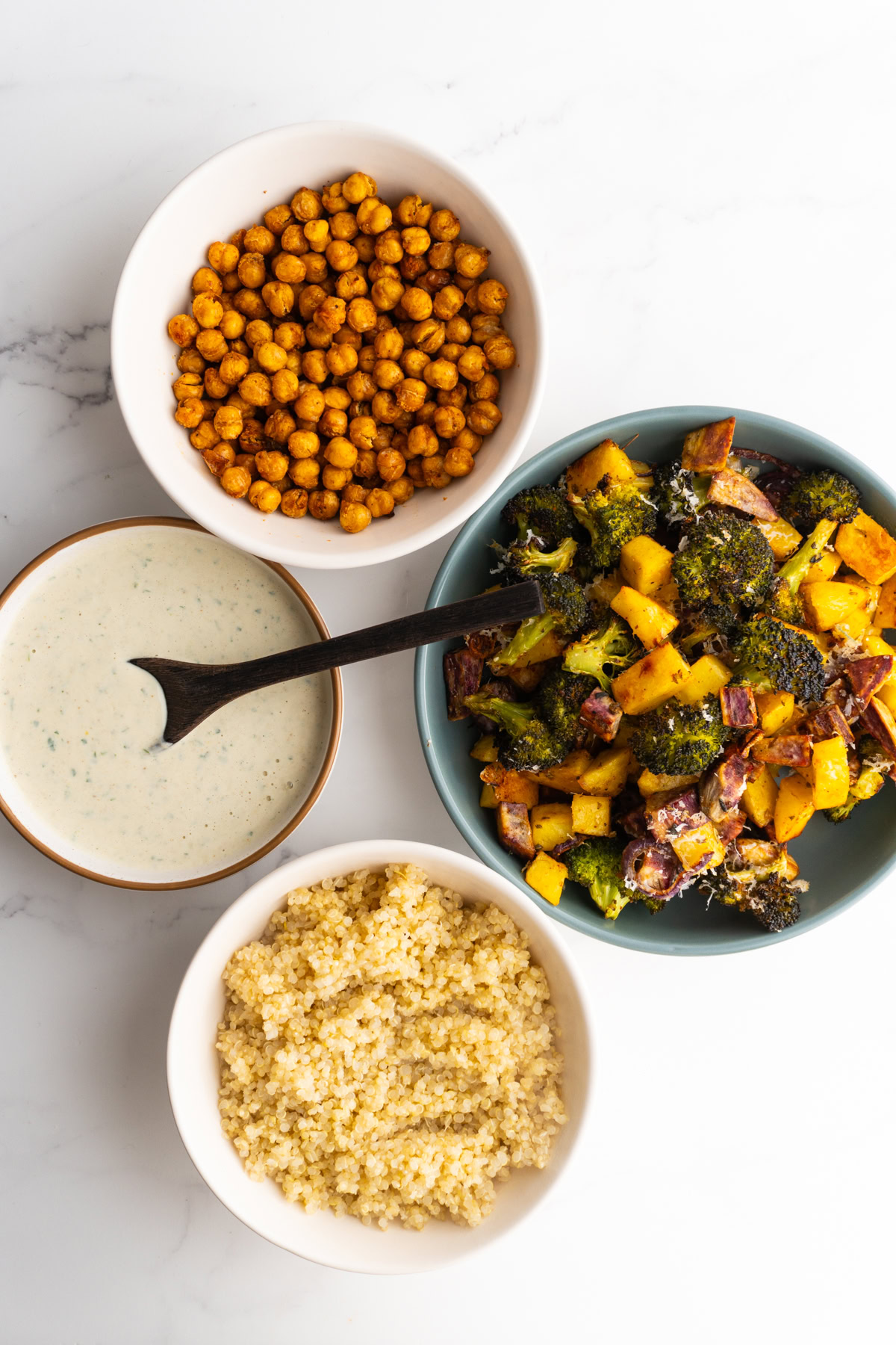 Ingredients needed to make roasted veggie bowls.