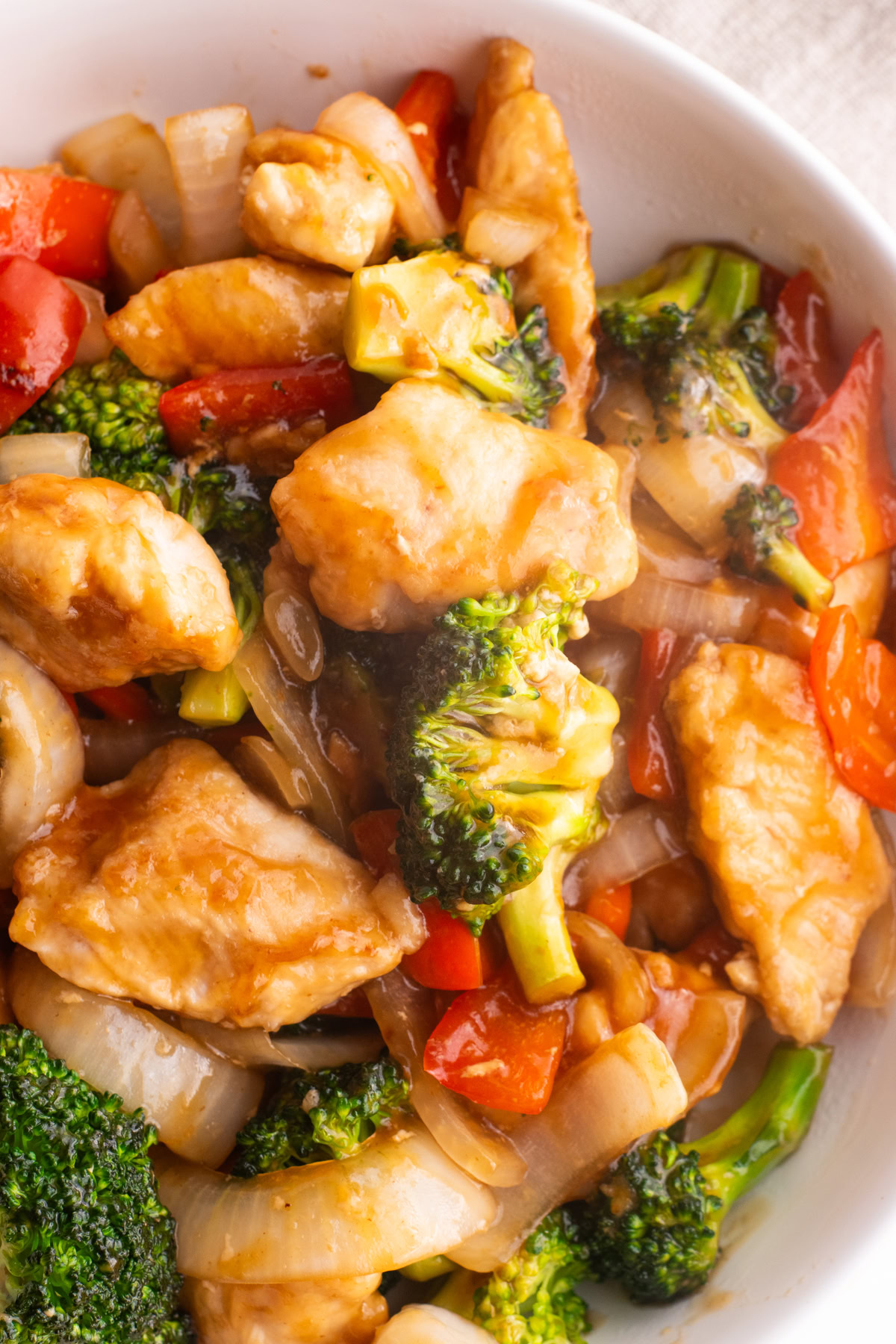 Close up of chicken teriyaki stir fry in a bowl.