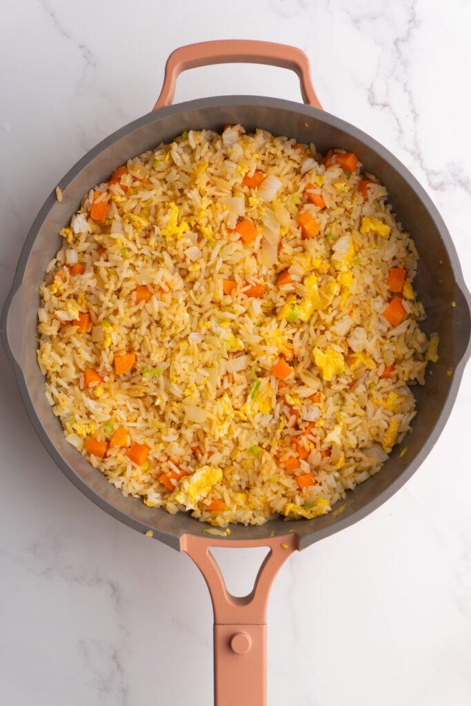 Finished hibachi fried rice in a skillet.