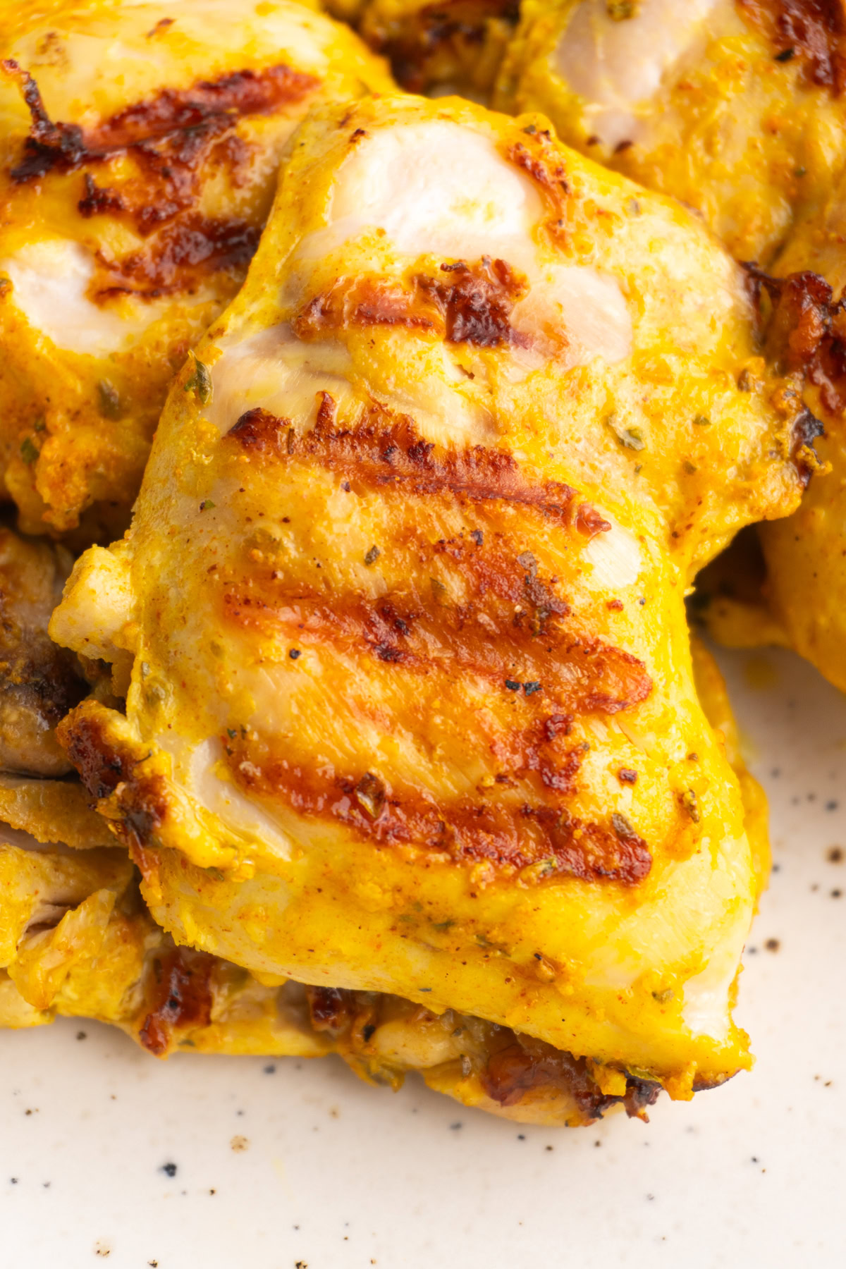 Grilled chicken thigh with shawarma marinade.