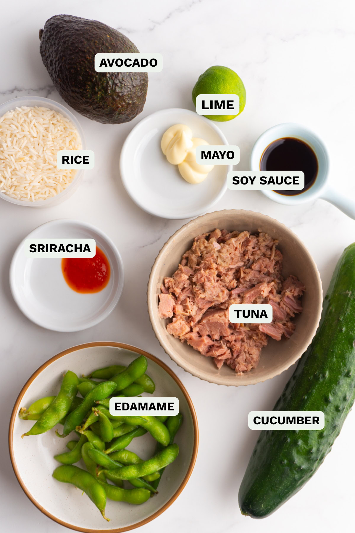 Ingredients needed to make spicy tuna bowls.