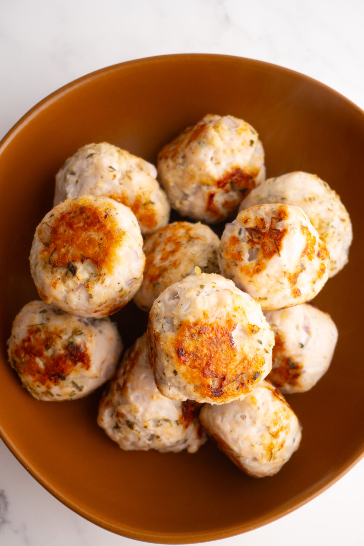 Greek turkey meatballs in a bowl.