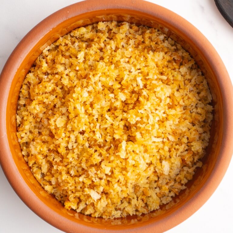 Overhead shot of garlic toasted breadcrumbs served in a bowl.