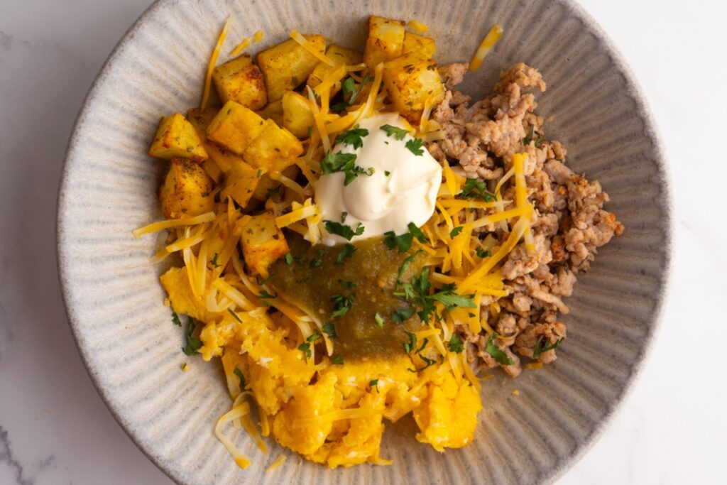Close up of a breakfast burrito bowl.