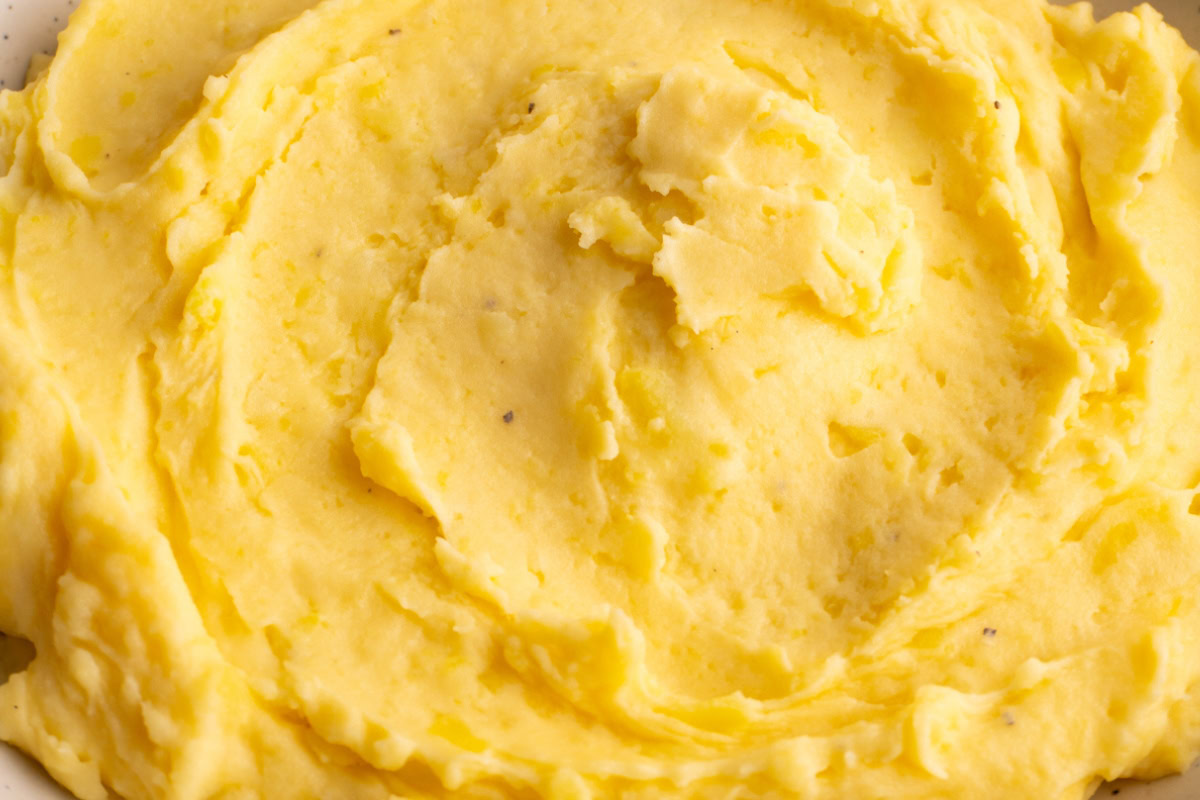 Close up of creamy cheesy mashed potatoes.