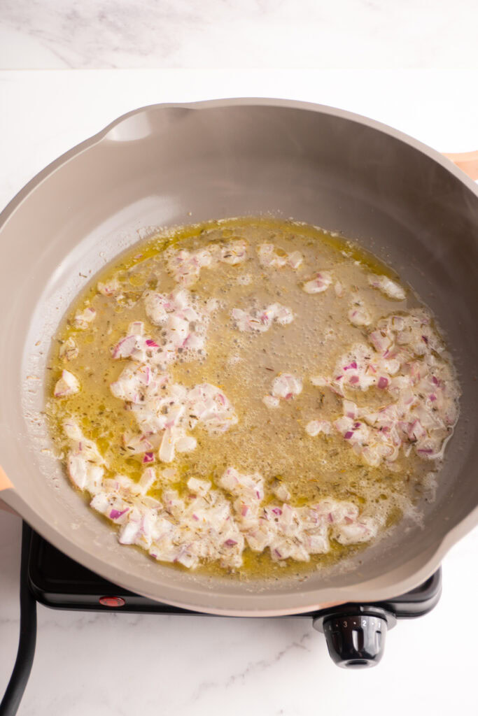 Sautéed shallots in butter.