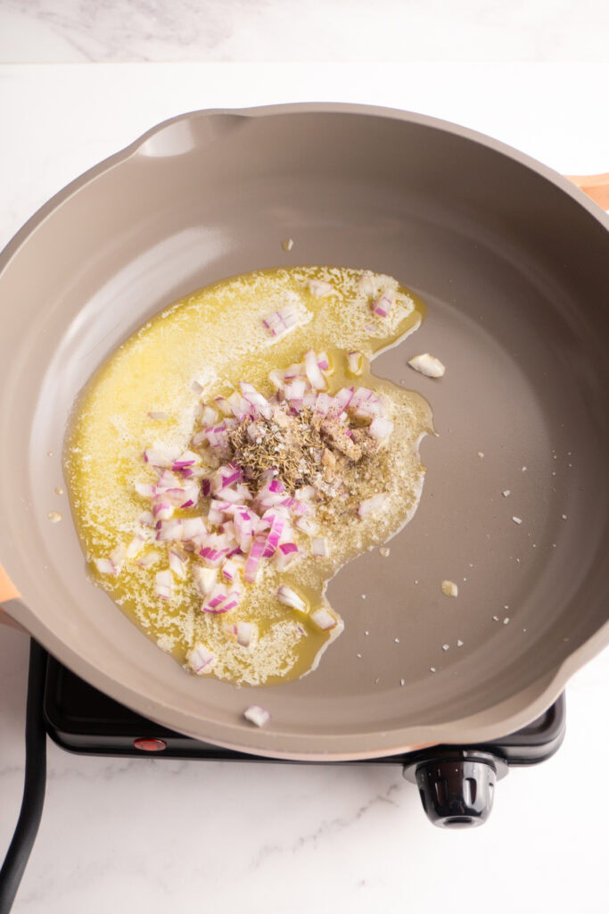 Butter, shallot, salt and thyme in a skillet to sauté.