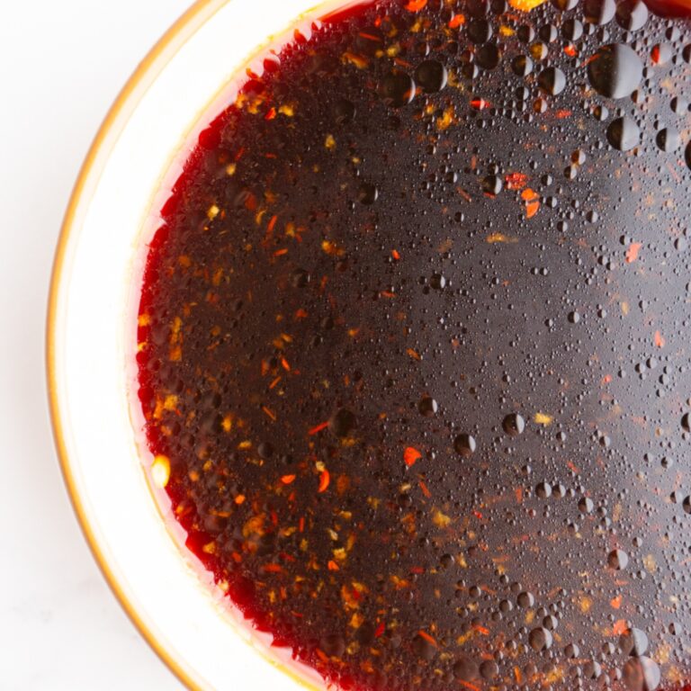 Close up of poke bowl sauce in a bowl.