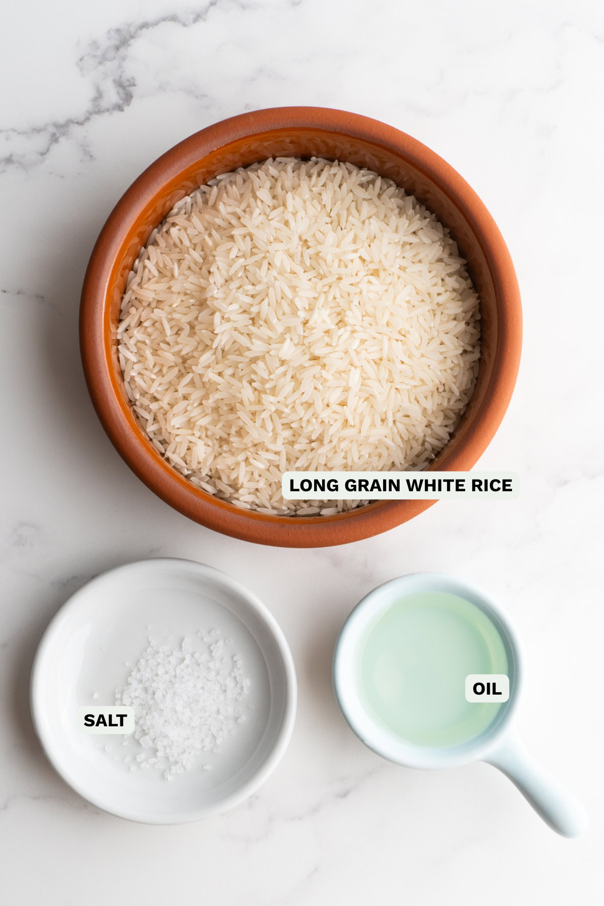 Ingredients needed to make the perfect rice on the stovetop.