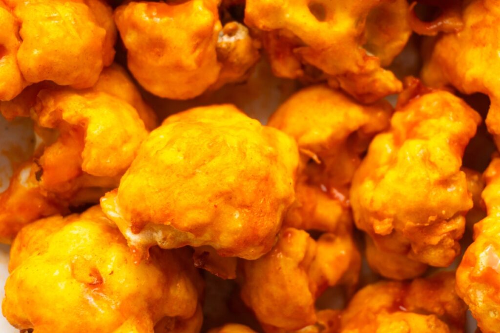 Close up of air fryer buffalo cauliflower.