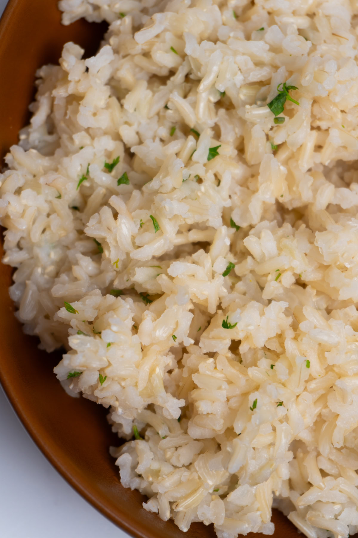 Close up of cilantro lime brown rice in a bowl.